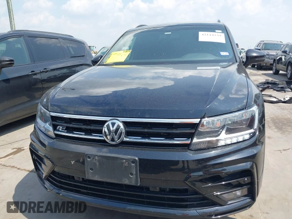 2021 Volkswagen Tiguan SE z VIN 3VV3B7AX0MM047478, wystawiony jako IAAI lot #42144239 z przebiegiem 55 468 mil mil oraz . Historia ofert i sprzedaży dostępna na DreamBid. Obrazek 13.