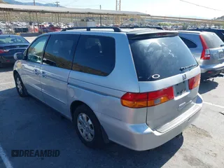 2002 Honda Odyssey EX-L z VIN 2HKRL18922H582244, wystawiony jako IAAI lot #42385121 z przebiegiem 253 186 mil mil oraz . Historia ofert i sprzedaży dostępna na DreamBid. Obrazek 3.