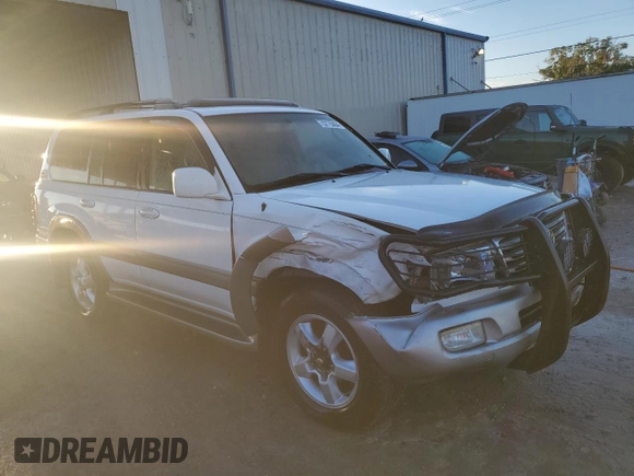 2004 Toyota Land Cruiser with VIN JTEHT05J042061303, listed as a Copart auction lot 73775064 with 0 mi miles and Salvage Title. Bid and sale history available at carsss.com. Image 4.