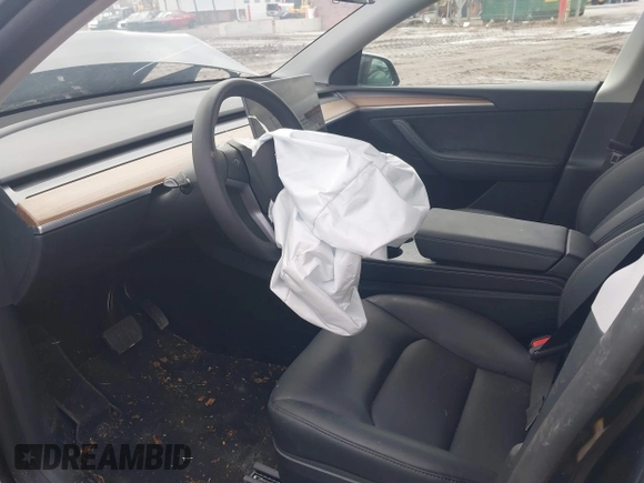 2025 Tesla Model Y Long Range with VIN 7SAYGDED3SF229605, listed as a IAAI auction lot 41726254 with Not Provided miles and . Bid and sale history available at DreamBid. Image 5.