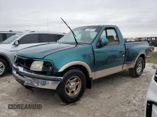 1997 Ford F-150 XL with VIN 1FTDF0765VKC35466, listed as a Copart auction lot 74205574 with 306,010 mi miles and Non repairable. Bid and sale history available at DreamBid. Image 1.