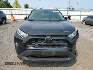 2019 Toyota RAV4 XLE with VIN JTMP1RFV8KJ001784, listed as a Copart auction lot 59109235 with 98,858 mi miles and Salvage title. Bid and sale history available at DreamBid. Image 5.