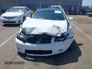 2006 Scion tC with VIN JTKDE167160120517, listed as a IAAI auction lot 42111042 with 174,220 mi miles. Bid and sale history available at carsss.com. Image 6.