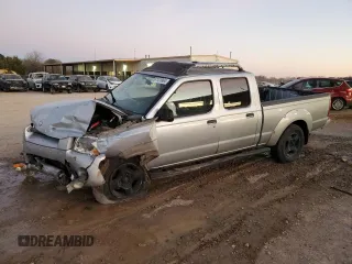 2002 Nissan Frontier XE z VIN 1N6ED29X32C353210, wystawiony jako Copart lot #87131864 z przebiegiem Nie podano mil oraz Szkoda całkowita • Salvage title. Historia ofert i sprzedaży dostępna na DreamBid. Obrazek 1.