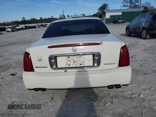 2001 Cadillac DeVille z VIN 1G6KD54Y61U227040, wystawiony jako Copart lot #46423295 z przebiegiem 180 289 mil mil oraz Szkoda całkowita • Salvage title. Historia ofert i sprzedaży dostępna na DreamBid. Obrazek 6.