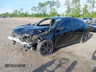 2019 Honda Civic Sport with VIN 2HGFC2F82KH553176, listed as a IAAI auction lot 42395963 with 73,950 mi miles and . Bid and sale history available at DreamBid. Image 16.