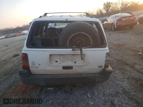 1993 Jeep Grand Cherokee Laredo with VIN 1J4GZ58Y9PC677532, listed as a Copart auction lot 44391245 with 178,772 mi miles and Salvage Title. Bid and sale history available at carsss.com. Image 6.
