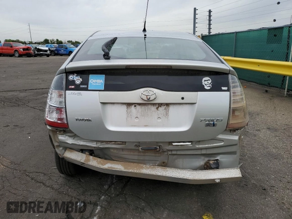 2004 Toyota Prius z VIN JTDKB20U440013051, wystawiony jako Copart lot #58375075 z przebiegiem 179 910 mil mil oraz Szkoda całkowita • Salvage title. Historia ofert i sprzedaży dostępna na DreamBid. Obrazek 6.