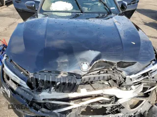 2020 BMW 3 Series 330i xDrive with VIN 3MW5R7J07L8B35275, listed as a Copart auction lot 59894105 with 28,310 mi miles and Salvage title. Bid and sale history available at DreamBid. Image 12.