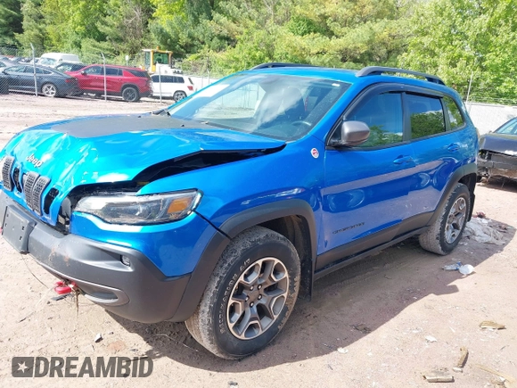 2020 Jeep Cherokee Trailhawk with VIN 1C4PJMBXXLD636547, listed as a IAAI auction lot 42314654 with 59,061 mi miles and . Bid and sale history available at DreamBid. Image 2.