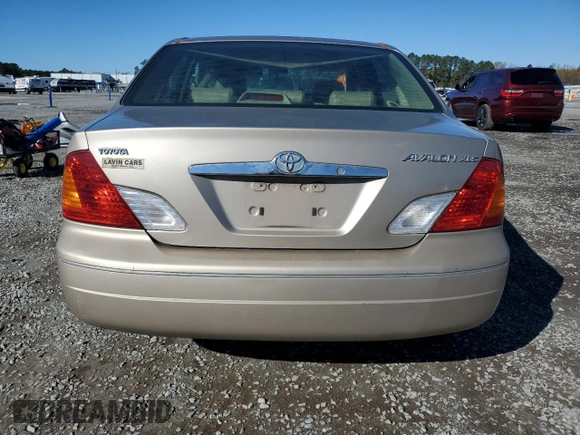 2000 Toyota Avalon XL z VIN 4T1BF28BXYU105489, wystawiony jako Copart lot #81673224 z przebiegiem 139 449 mil mil oraz Szkoda całkowita • Salvage title. Historia ofert i sprzedaży dostępna na DreamBid. Obrazek 6.