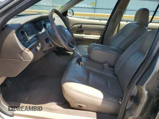 2003 Ford Crown Victoria LX z VIN 2FAFP74W43X123583, wystawiony jako Copart lot #57677555 z przebiegiem 185 336 mil mil oraz Szkoda całkowita • Salvage title. Historia ofert i sprzedaży dostępna na DreamBid. Obrazek 7.
