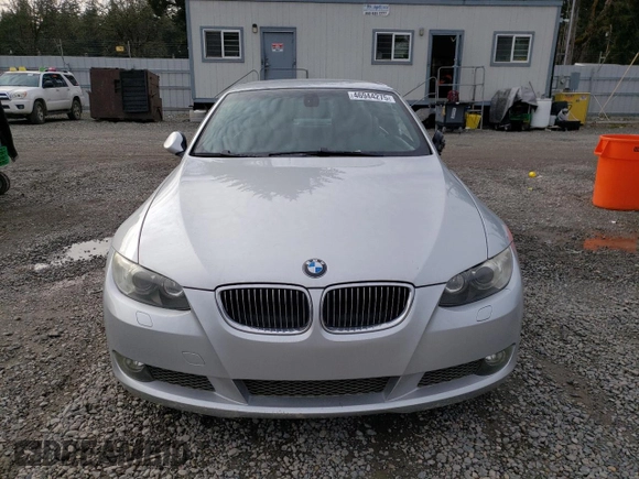 2007 BMW 3 Series 335i with VIN WBAWL73557PX46590, listed as a Copart auction lot 46944275 with 65,939 mi miles and Salvage Title. Bid and sale history available at carsss.com. Image 5.