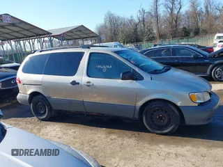 2003 Toyota Sienna LE with VIN 4T3ZF13C03U524122, listed as a IAAI auction lot 41655361 with 216,256 mi miles. Bid and sale history available at carsss.com. Image 13.