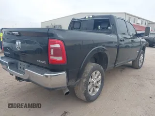2020 Ram 2500 Laramie z VIN 3C6UR5FL6LG284652, wystawiony jako IAAI lot #41536970 z przebiegiem 92 566 mil mil oraz . Historia ofert i sprzedaży dostępna na DreamBid. Obrazek 4.