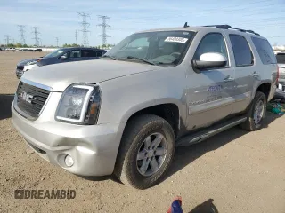 2007 GMC Yukon SLT z VIN 1GKFK13047J386629, wystawiony jako Copart lot #56400305 z przebiegiem 188 428 mil mil oraz Czysty tytuł • Clean title. Historia ofert i sprzedaży dostępna na DreamBid. Obrazek 1.