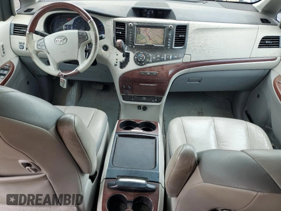 2011 Toyota Sienna XLE AAS with VIN 5TDYK3DC4BS045123, listed as a Copart auction lot 61001785 with 149,260 mi miles and Salvage title. Bid and sale history available at DreamBid. Image 8.