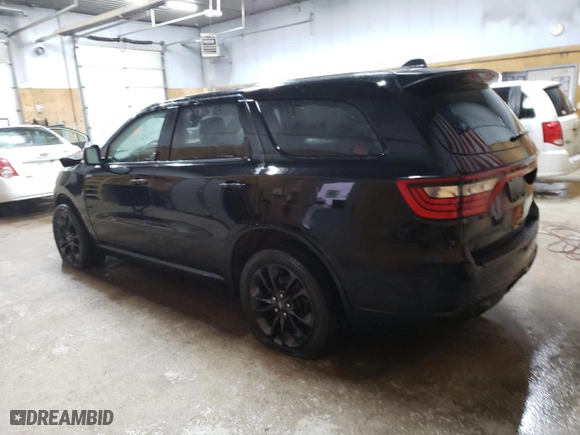 2022 Dodge Durango GT Plus with VIN 1C4RDJDG2NC161027, listed as a Copart auction lot 87187604 with 56,283 mi miles and Salvage Title. Bid and sale history available at carsss.com. Image 2.