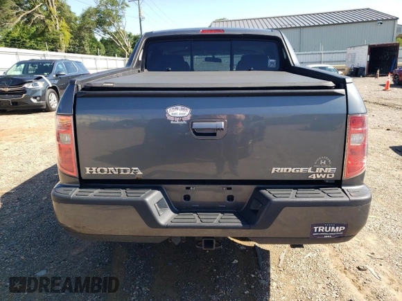 2011 Honda Ridgeline RTL with VIN 5FPYK1F51BB007802, listed as a Copart auction lot 63261935 with 397,803 mi miles and Clean title. Bid and sale history available at DreamBid. Image 6.