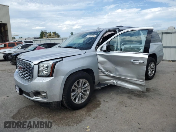 2020 GMC Yukon XL Denali with VIN 1GKS2HKJ4LR201038, listed as a Copart auction lot 66917904 with 99,944 mi miles and Salvage Title. Bid and sale history available at carsss.com. Image 1.