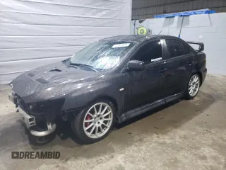 2014 Mitsubishi Lancer Evolution GSR with VIN JA32W8FV5EU017979, listed as a Copart auction lot 47222615 with 109,632 mi miles and Salvage Title. Bid and sale history available at carsss.com. Image 1.