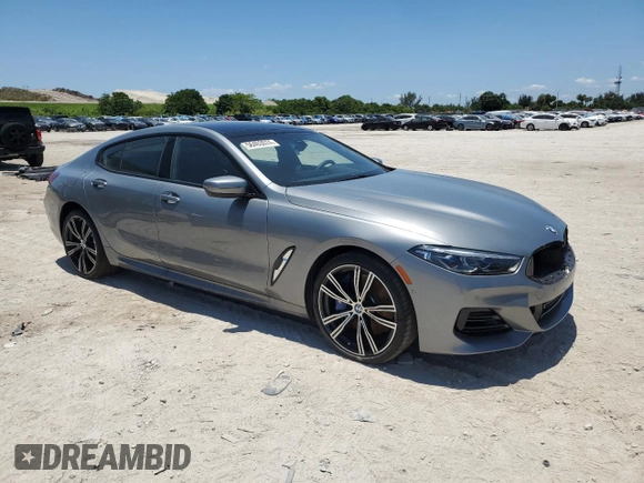 2024 BMW 8 Series 840i with VIN WBAGV2C02RCP37314, listed as a Copart auction lot 56403074 with 94 mi miles and Salvage Title. Bid and sale history available at carsss.com. Image 4.