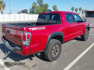2021 Toyota Tacoma SR z VIN 5TFCZ5AN8MX247421, wystawiony jako IAAI lot #42147910 z przebiegiem 94 467 mil mil oraz . Historia ofert i sprzedaży dostępna na DreamBid. Obrazek 4.