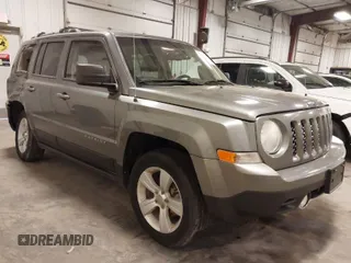 2014 Jeep Patriot Limited with VIN 1C4NJRCBXED546471, listed as a IAAI auction lot 41744915 with 113,691 mi miles. Bid and sale history available at carsss.com. Image 1.