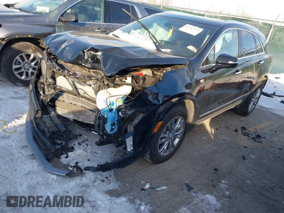 2021 Cadillac XT5 AWD Premium Luxury with VIN 1GYKNDRS2MZ152878, listed as a IAAI auction lot 41347259 with 21,891 mi miles. Bid and sale history available at carsss.com. Image 2.
