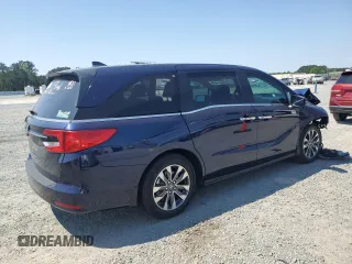 2023 Honda Odyssey EX-L z VIN 5FNRL6H66PB059463, wystawiony jako Copart lot #52288865 z przebiegiem Nie podano mil oraz Szkody całkowita. Historia ofert i sprzedaży dostępna na DreamBid. Obrazek 3.