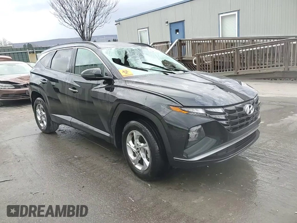 2023 Hyundai Tucson SEL with VIN 5NMJBCAE2PH270674, listed as a Copart auction lot 82879614 with 11,673 mi miles and Salvage Title. Bid and sale history available at DreamBid. Image 14.