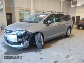 2021 Chrysler Voyager LXi with VIN 2C4RC1DG2MR506453, listed as a IAAI auction lot 41770938 with 90,255 mi miles and . Bid and sale history available at DreamBid. Image 2.
