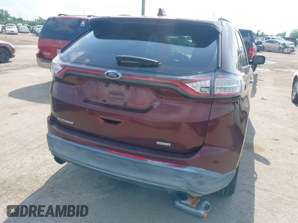 2015 Ford Edge SEL with VIN 2FMPK3J96FBC26148, listed as a IAAI auction lot 42096085 with 164,385 mi miles. Bid and sale history available at carsss.com. Image 4.