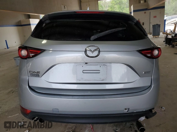 2018 Mazda CX-5 Grand Touring with VIN JM3KFADM4J0349097, listed as a Copart auction lot 59912875 with Not provided miles and Non repairable. Bid and sale history available at DreamBid. Image 6.