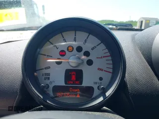 2012 MINI Countryman z VIN WMWZB3C50CWM29681, wystawiony jako IAAI lot #42408117 z przebiegiem 157 105 mil mil oraz . Historia ofert i sprzedaży dostępna na DreamBid. Obrazek 7.