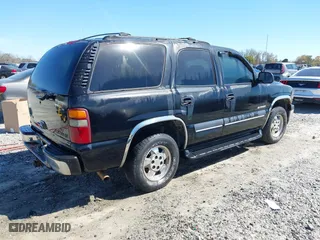 2001 Chevrolet Tahoe LT with VIN 1GNEC13T41J155954, listed as a IAAI auction lot 41810200 with 222,109 mi miles. Bid and sale history available at carsss.com. Image 4.