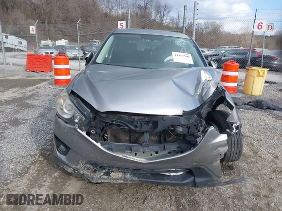 2013 Mazda CX-5 Touring with VIN JM3KE2CE9D0133348, listed as a IAAI auction lot 41357592 with 122,227 mi miles. Bid and sale history available at carsss.com. Image 11.