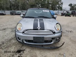 2009 MINI Convertible с VIN WMWMR33579TU95581, выставлен на аукционе Copart как лот 45914735 с пробегом 129 790 миль миль и Списание • Salvage title. История ставок и продаж доступна на DreamBid. Изображение 5.