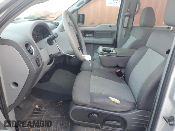 2006 Ford F-150 XLT with VIN 1FTRW12W36KC59835, listed as a Copart auction lot 52481585 with 201,301 mi miles and Salvage Title. Bid and sale history available at DreamBid. Image 7.