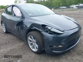 2023 Tesla Model Y Performance with VIN 7SAYGDEF0PF947959, listed as a IAAI auction lot 39425685 with 9,370 mi miles and . Bid and sale history available at DreamBid. Image 1.