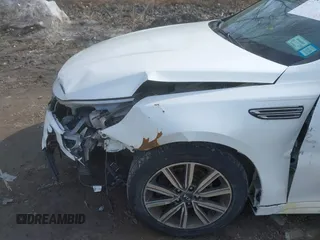 2019 Kia Optima LX with VIN 5XXGT4L38KG300213, listed as a IAAI auction lot 41775052 with 141,402 mi miles. Bid and sale history available at carsss.com. Image 6.
