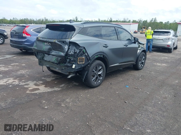 2023 Kia Sportage SX-Prestige with VIN KNDPXCAG7P7071365, listed as a IAAI auction lot 42247639 with 21,509 mi miles and . Bid and sale history available at DreamBid. Image 4.