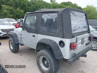 2005 Jeep Wrangler X z VIN 1J4FA39S95P370868, wystawiony jako IAAI lot #42476186 z przebiegiem 144 986 mil mil oraz . Historia ofert i sprzedaży dostępna na DreamBid. Obrazek 14.