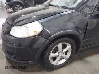2009 Suzuki SX4 Man AWD with VIN JS2YB413596200885, listed as a IAAI auction lot 41189776 with 111,891 mi miles. Bid and sale history available at carsss.com. Image 6.