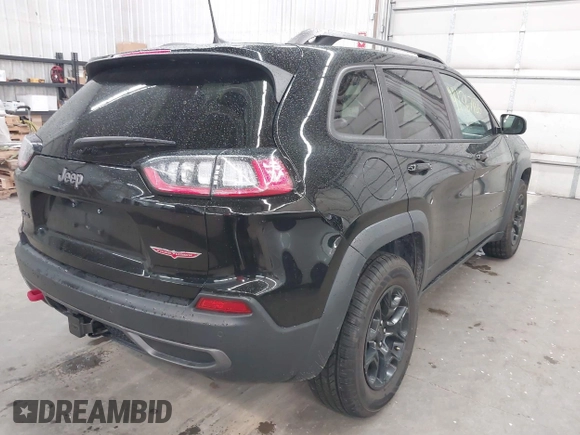 2019 Jeep Cherokee Trailhawk with VIN 1C4PJMBX9KD456748, listed as a IAAI auction lot 42367186 with 91,665 mi miles and . Bid and sale history available at DreamBid. Image 4.