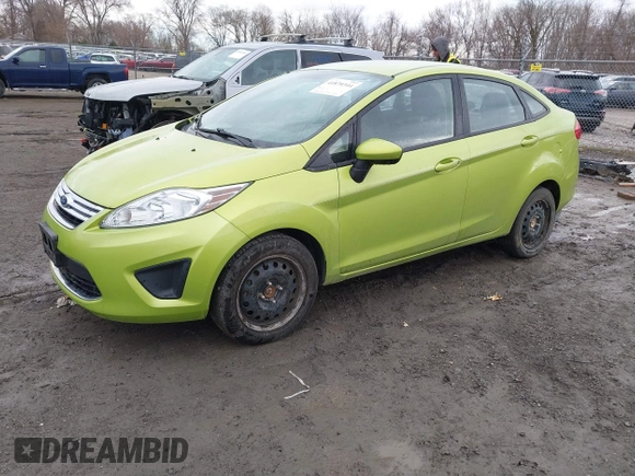 2012 Ford Fiesta SE with VIN 3FADP4BJ1CM140589, listed as a IAAI auction lot 41870344 with 158,558 mi miles. Bid and sale history available at carsss.com. Image 2.