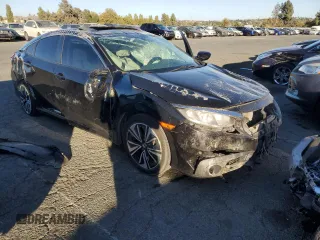 2017 Honda Civic EX-T with VIN 19XFC1E3XHE006935, listed as a Copart auction lot 70423094 with Not Provided miles and Salvage Title. Bid and sale history available at DreamBid. Image 4.