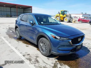 2019 Mazda CX-5 Touring with VIN JM3KFACM9K0686951, listed as a IAAI auction lot 41870797 with 66,303 mi miles. Bid and sale history available at carsss.com. Image 1.