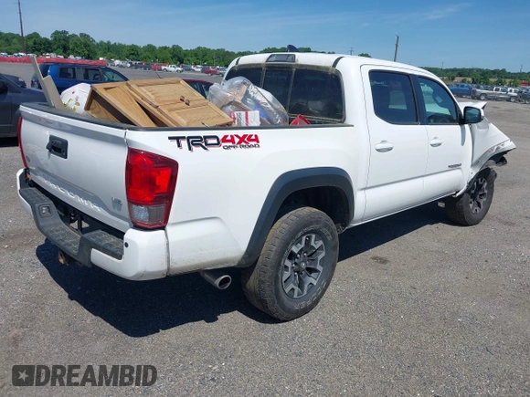 2016 Toyota Tacoma SR with VIN 3TMCZ5AN0GM003224, listed as a IAAI auction lot 42289910 with 140,899 mi miles and . Bid and sale history available at DreamBid. Image 4.