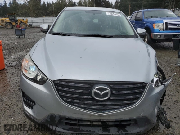 2016 Mazda CX-5 Sport z VIN JM3KE4BY5G0726376, wystawiony jako Copart lot #52009995 z przebiegiem 113 533 mil mil oraz Szkoda całkowita • Salvage title. Historia ofert i sprzedaży dostępna na DreamBid. Obrazek 5.
